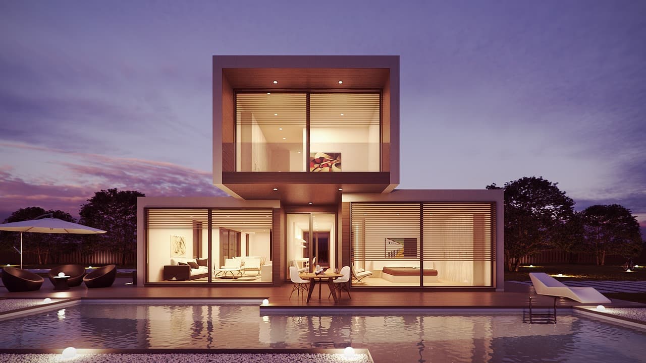 Sacramento home at dusk with warm-toned permanent LED exterior lights mounted along the roofline, demonstrating downward-directed lighting that minimizes light trespass into neighboring properties