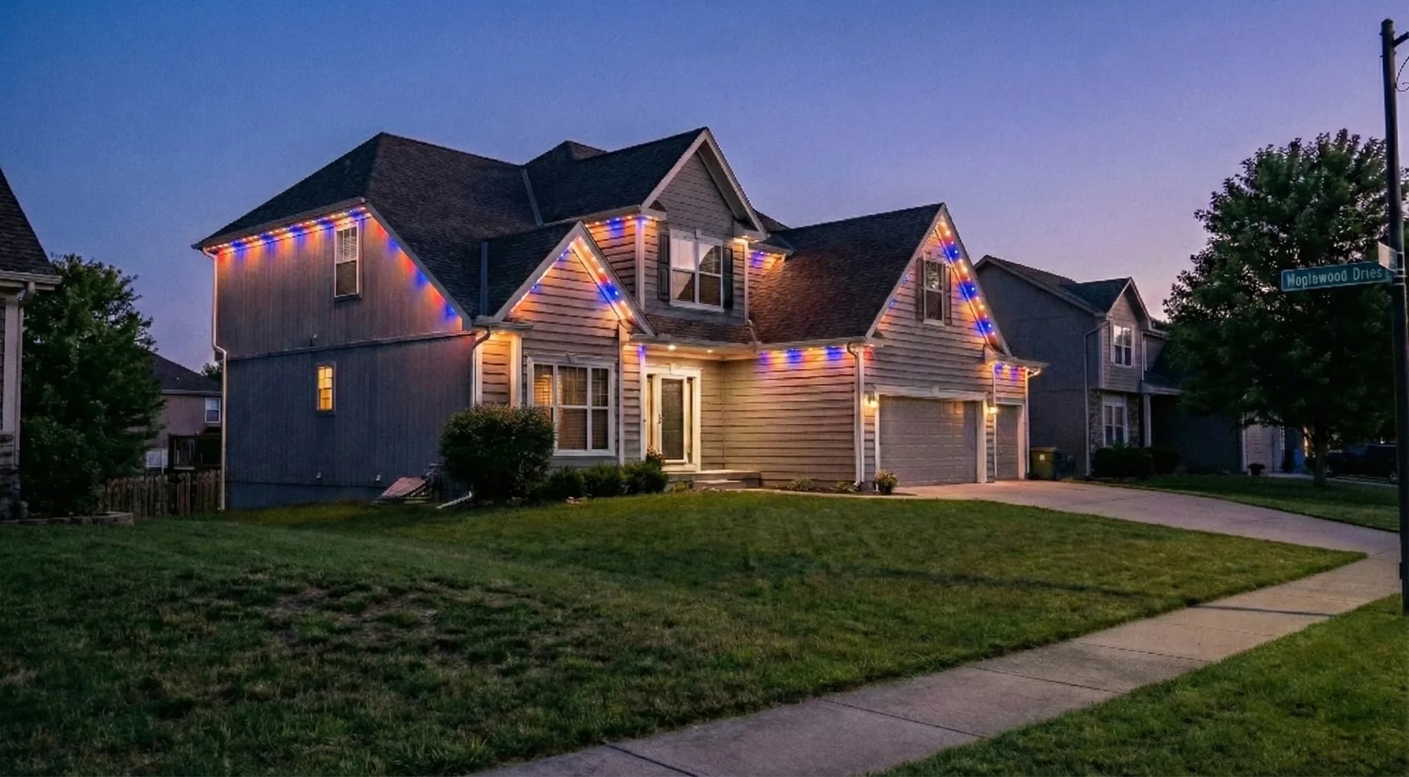 Beautiful home with 4th of July permanent LED exterior lighting