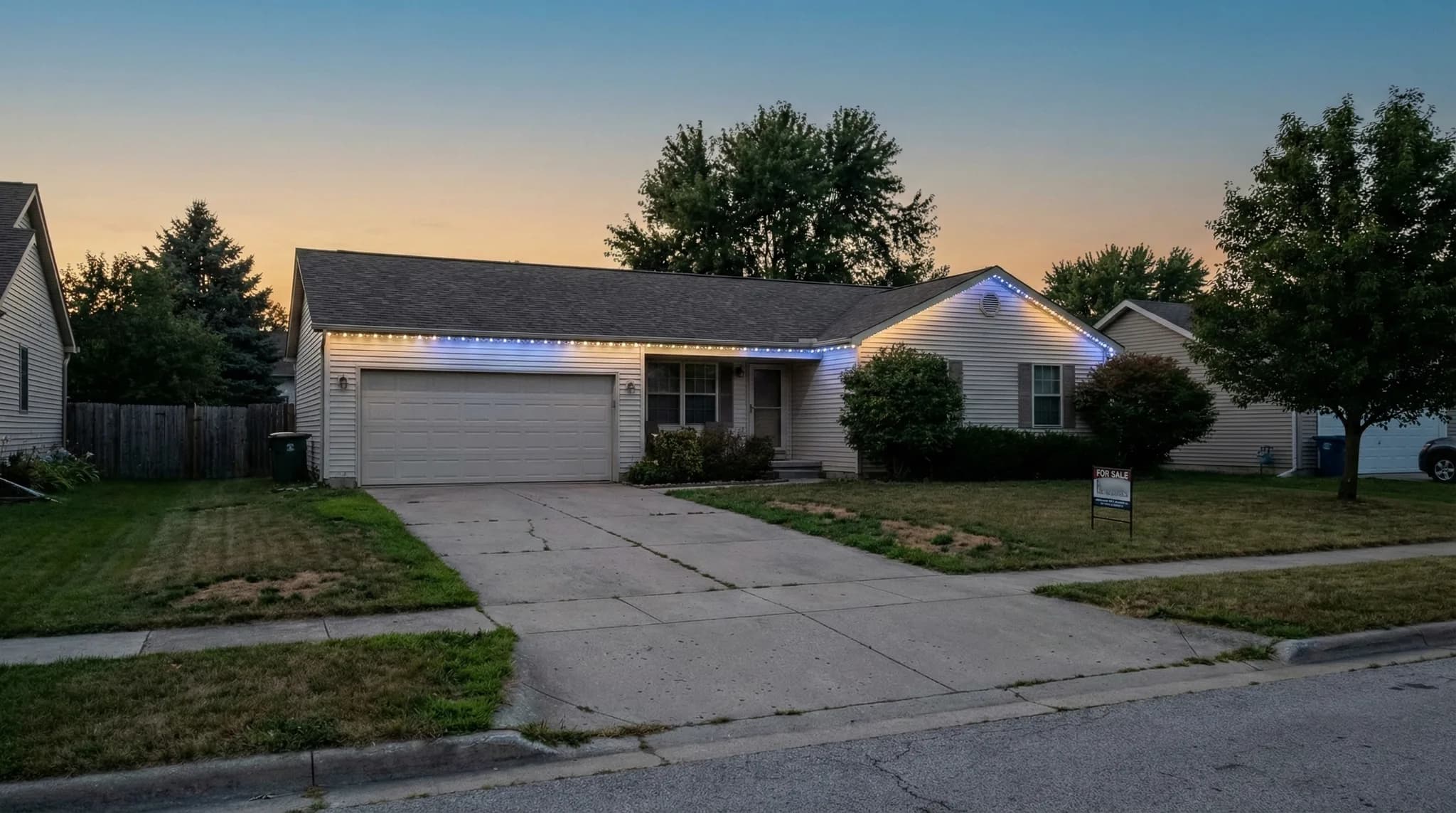 Ranch home with cool blue accent lighting on roofline